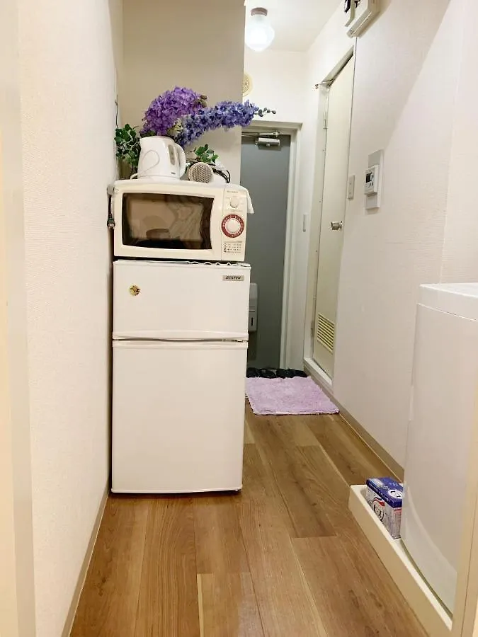 Nishi Shinjuku Apartment: Prime Location, 6-Min Walk to Metro Tokyo Apartment